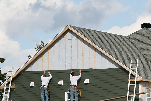Professional Siding Contractor technician working in Orviston, PA
